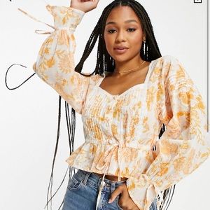 Button through top with paisley design in orange